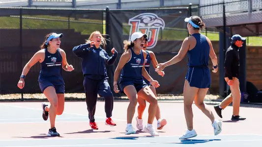 Women's Tennis Celebrates Following Match Point