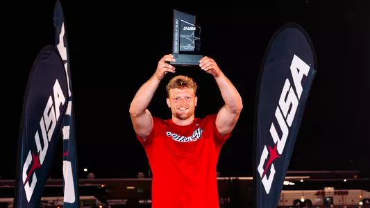 Christian Hicks with CUSA Award