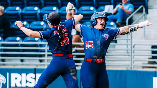 Rachel Roupe and Paige Doerr High Five FIU 2025