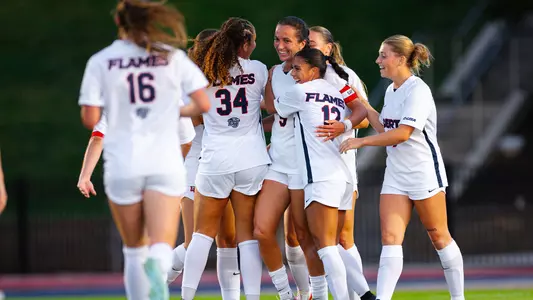 Women's Soccer- Team celebrates following an Ivy Garner goal