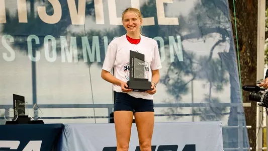 Allie Zealand with Trophy after 2025 CUSA XC