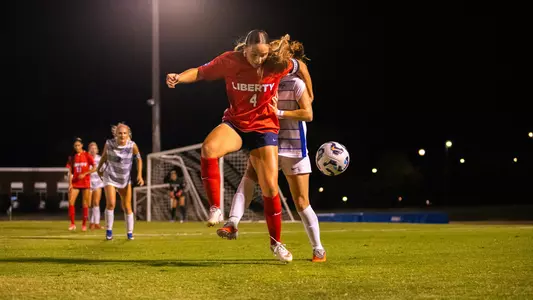 Women's Soccer Halle Engle holds off a MTSU defender in a game against Middle Tennessee on the road