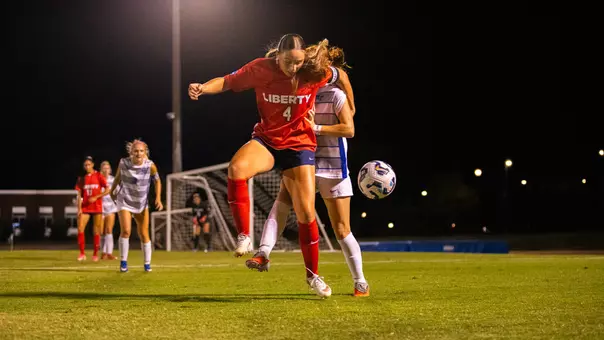 Women's Soccer Halle Engle holds off a MTSU defender in a game against Middle Tennessee on the road