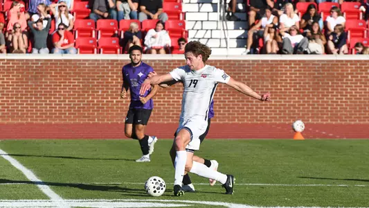 Men's Soccer - Lachlan Middleton Moves the Ball Past Midfield