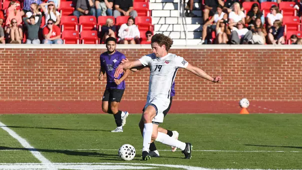 Men's Soccer - Lachlan Middleton Moves the Ball Past Midfield