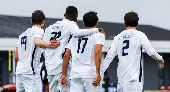 Men's Soccer - Players Middleton, Montavele, Vitorino and Sousa Embrace