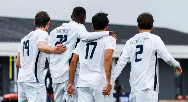 Men's Soccer - Players Middleton, Montavele, Vitorino and Sousa Embrace