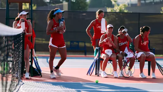 Women's Tennis on Bench during a practice