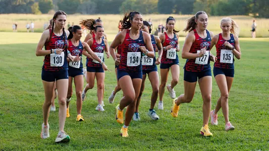 The women's cross country team warms up for the Eye Opener on Sept. 4, 2026.
