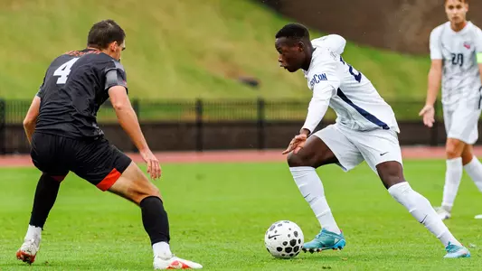 Men's Soccer - Pablo Matavele makes a move on a Mercer defender 10-3-26