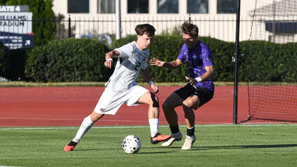 Men's Soccer - Goncarlo Sousa Moves Past a Defender