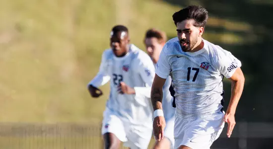 Men's Soccer - Manuel Vitorino Heads Down Field in a Game Earlier this Year