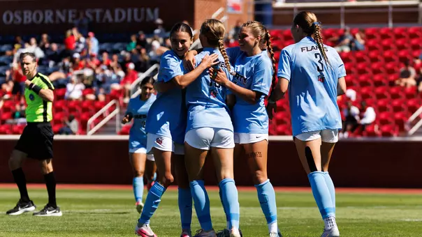 Women's Soccer Celebrates a goal in a home game at Osborne Stadium