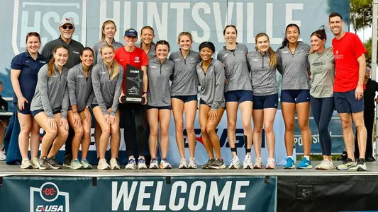 The Liberty women's cross country team poses with its runner-up trophy at the CUSA Cross Country Championships, Oct. 31, 2026 in Huntsville, Ala.