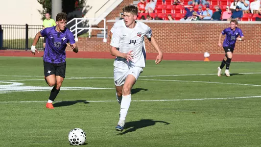 Men's Soccer - Spencer Moler Moves the Ball Against FGCU