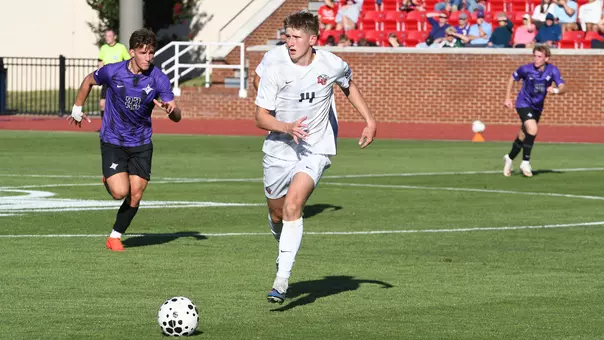 Men's Soccer - Spencer Moler Moves the Ball Against FGCU
