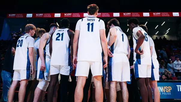 Men's Basketball Team Huddle Preview Photo vs. George Mason NIT First Round March 16, 2026