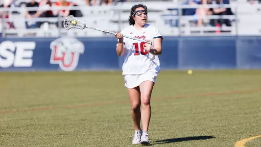 WLAX Kendall Coss makes a pass