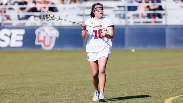 WLAX Kendall Coss makes a pass
