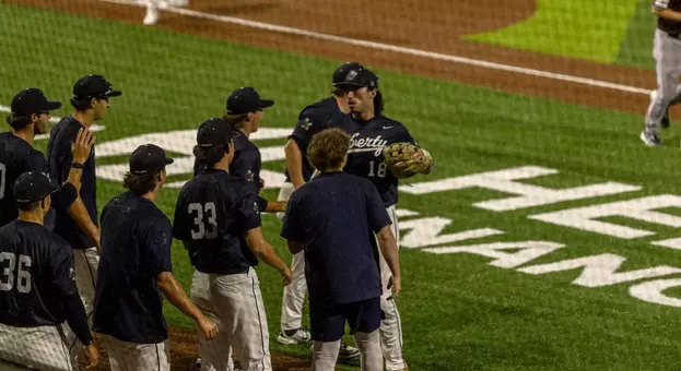 Baseball - Flames going into Dugout