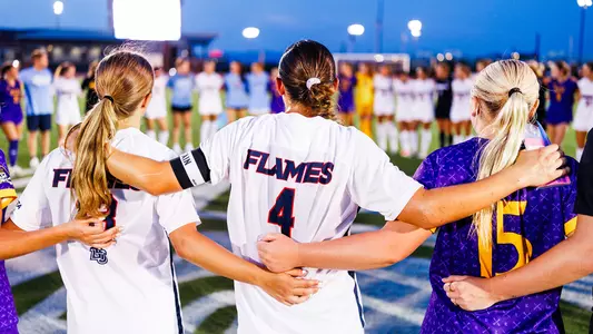 Women's Soccer huddles up for a prayer after a game against East Carolina