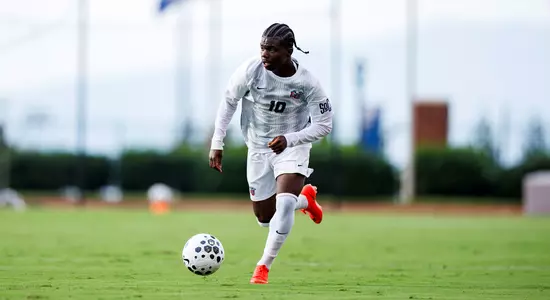 Men's Soccer - Samson Kpardeh moves up field vs. FGCU
