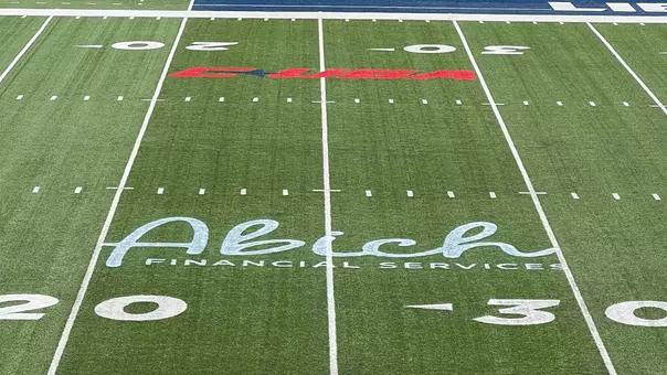 Football Abich Financial Logo on Williams Stadium playing surface - Press Release Announcement in 2026