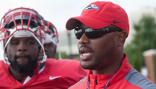 Assistant Coaches at practice. August 19, 2014, (photo by Les Schofer)