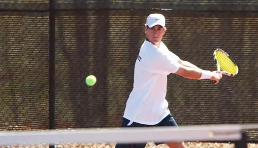 Liberty Tennis Team defeats UNCA. March 27, 2010. (Photo by Les Schofer)