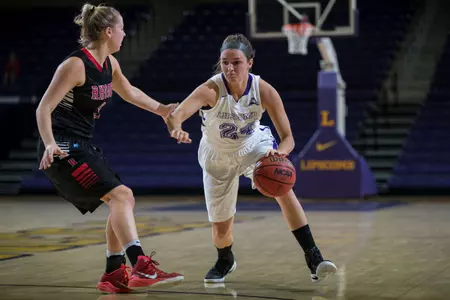 Banks nabs 1,000th career point as women's hoops wins on Senior Night Image