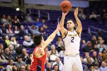 Andrew Fleming shooting ball