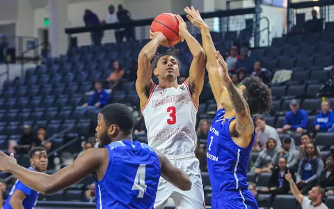Romeao Ferguson shooting a basketball
