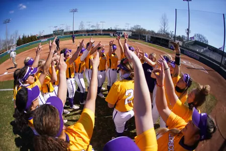 Softball team huddle