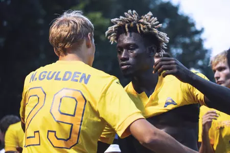 Bakary Bagayoko celebrates with Noah Gulden