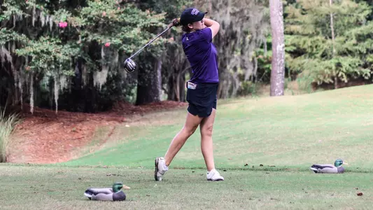 Lauren Thompson swinging