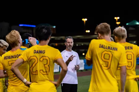 Charles Morrow Talks To His Team