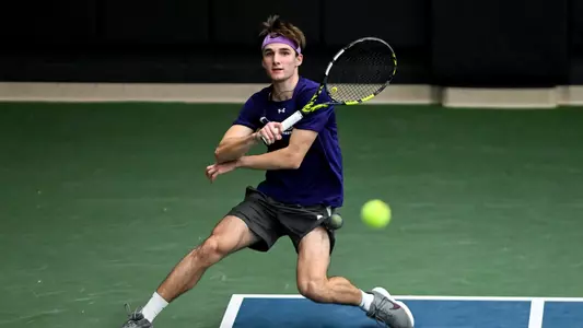 Filippo Verdese swinging his racquet