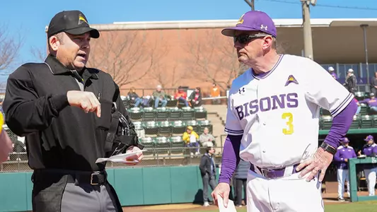 Jeff Forehand in a pregame meeting with the home plate umpire