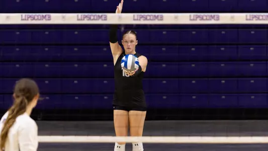 Kelsey Schenck serving