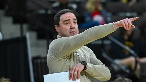 Kevin Carroll coaching during ASUN Tournament in 2026
