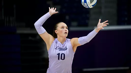 Kelsey Schenck serving