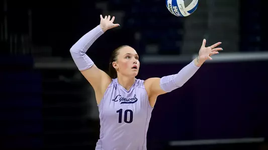 Kelsey Schenck serving