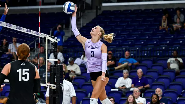 Sydney Strenger getting ready to spike a volleyball