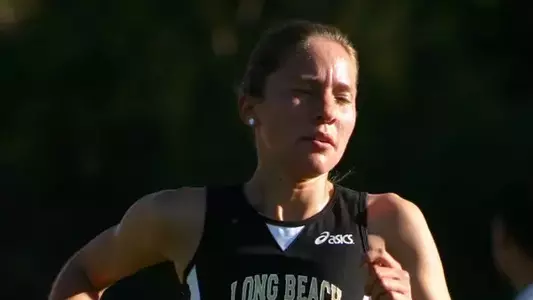 Senior Sarah Apgar ran a personal best of 17:14 to cross the finish line in first place at the Santa Clara Invitational