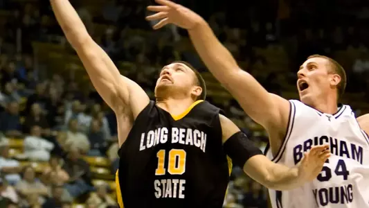 Aturas Lazdauskas puts in a lay-up while being fouled. (AP Photo/Douglas C. Pizac)