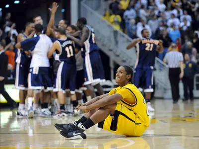 Casper Ware dejected after LBSU loses on last-second shot