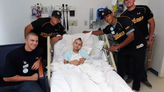 Steve Tinoco visits with Dallas Humprheys at Millers Children's Hospital.