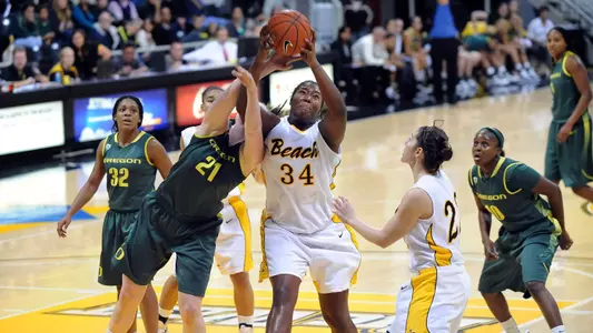 Freshman Janae Coffee finished with 13 points and 10 rebounds at Rice.