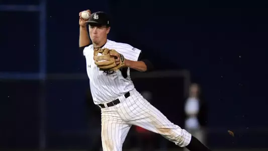 03-24-10- Long Beach State's infielder Kirk Singer throws the ball to second for an out in the inning against Hawaii, at Blair Field.
Stephen Carr / Press-Telegram