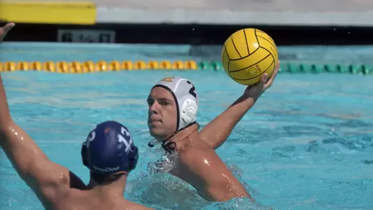 10/1//11 - Nathan McConnell (2) of the Long Beach Men's Water Polo team looks for an open shot.
Photo by Steven Georges/Long Beach State